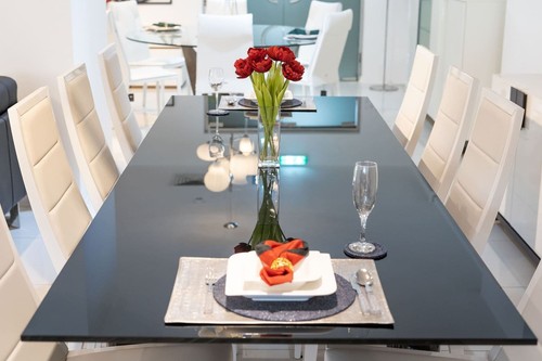 Yago Dining Table With Glass Top And 8 Saphire Dining ChairsBy Porada